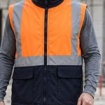 Turuncu ve lacivert renkli reflektörlü bonding polar iş yeleği