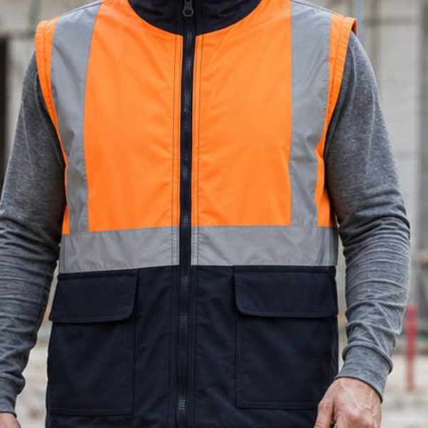 Turuncu ve lacivert renkli reflektörlü bonding polar iş yeleği
